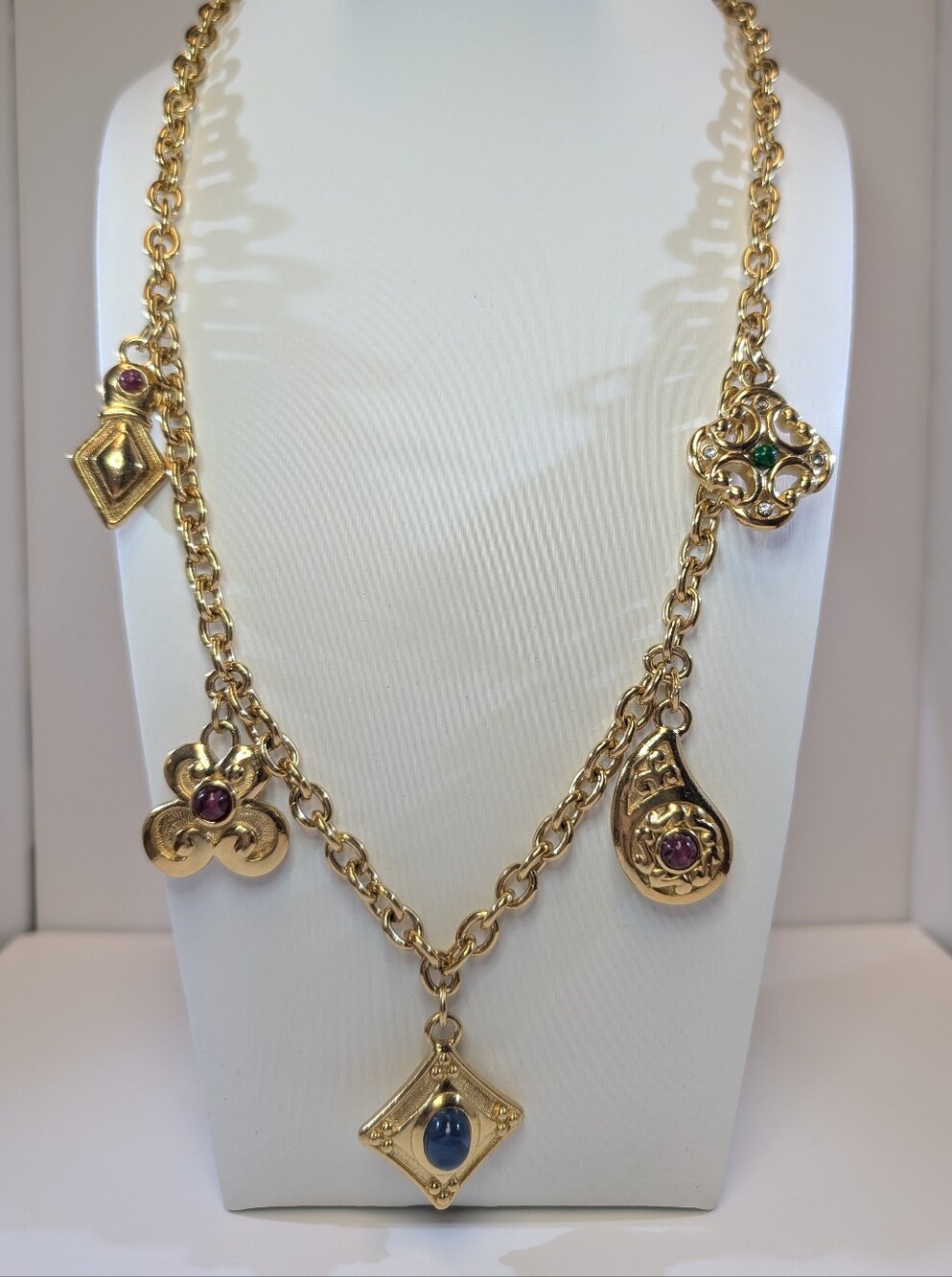 Gold-Tone Multi-Charm Necklace with Colored Gem Accents